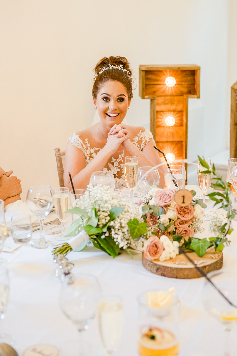 bride pulling face during speech