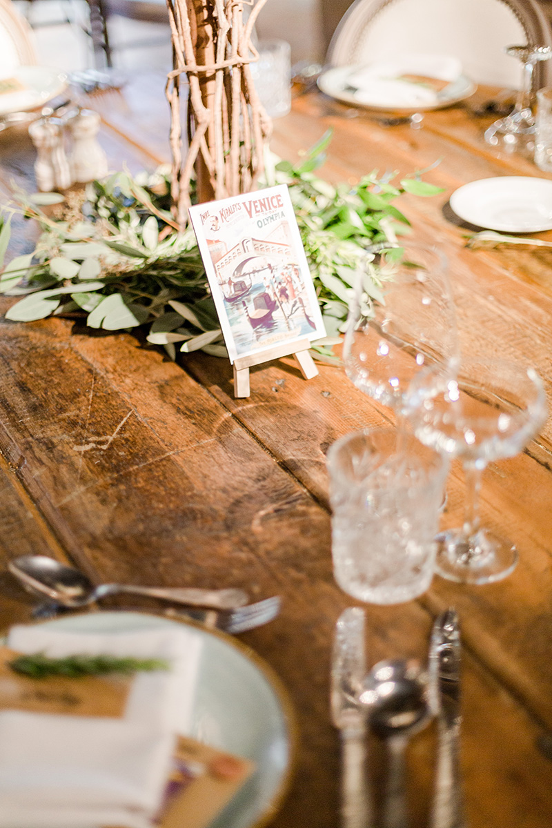 table setting with Italian postcard