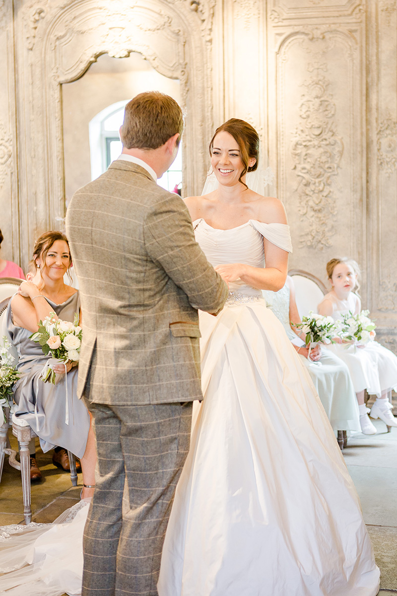 bride and groom facing each other in ceremony