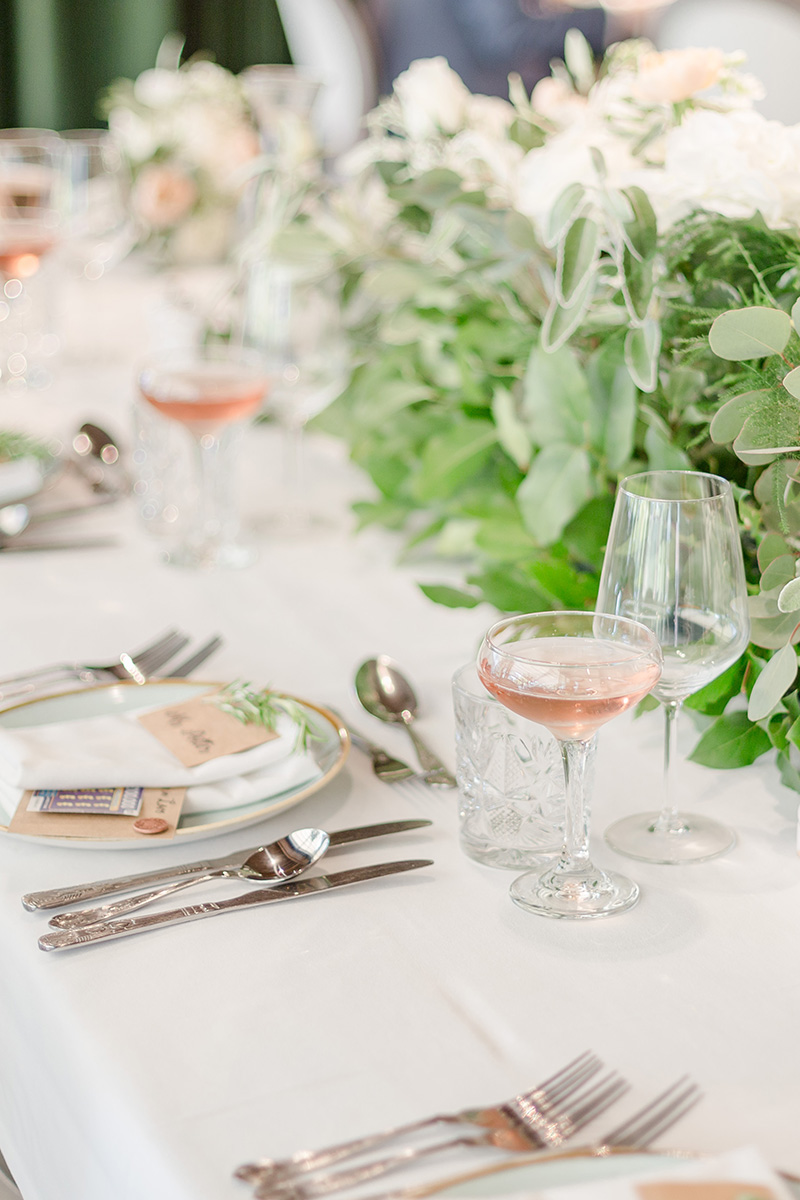 table setting with pink champaign