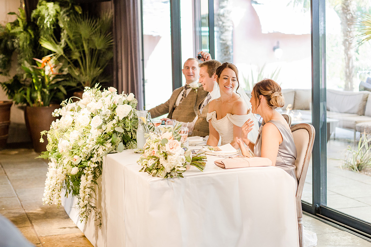 top table laughing and smiling