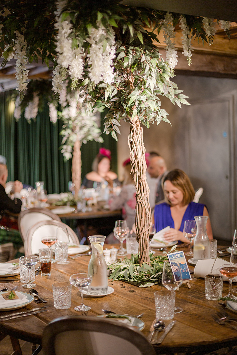 wedding table with tree in the middle