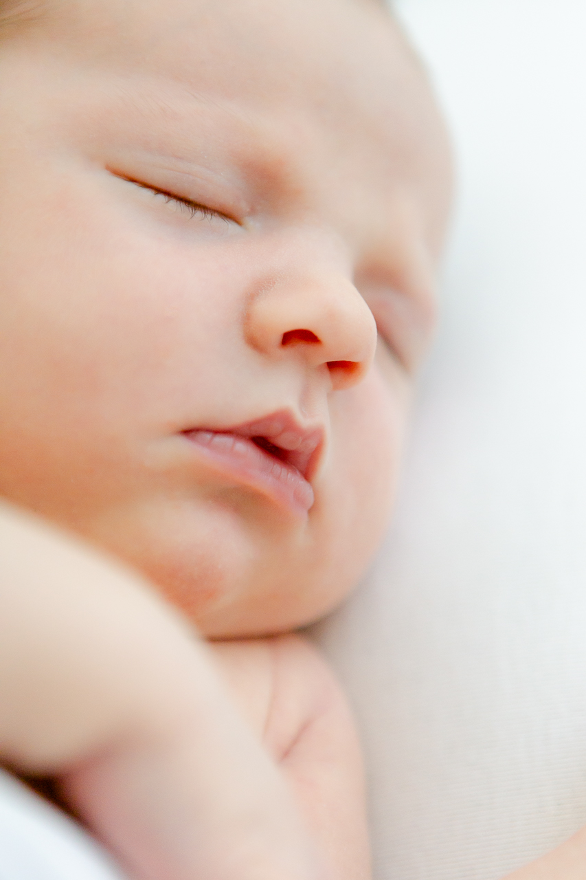 close up of newborn face and lips