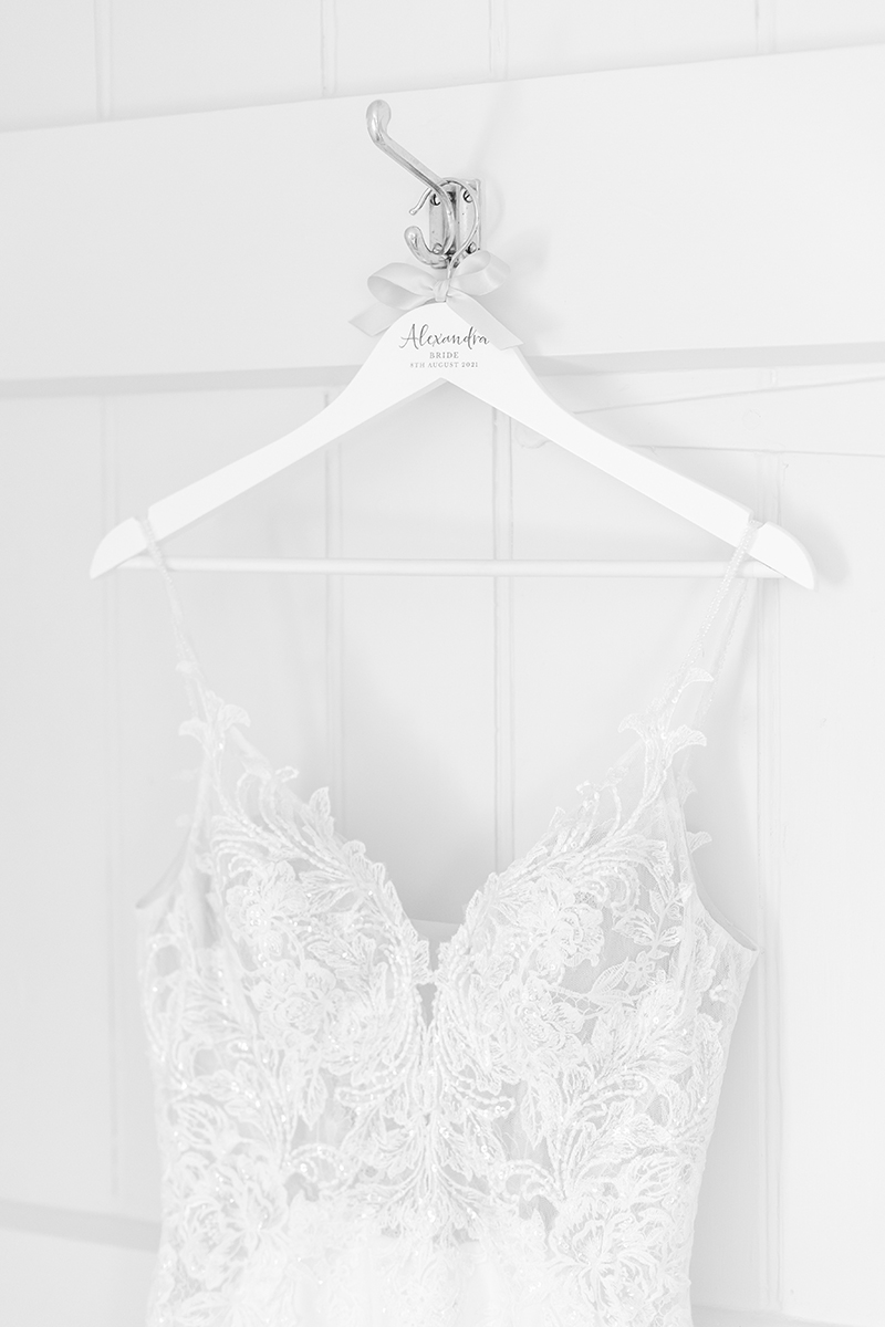 Wedding dress hanging on personalised hanger