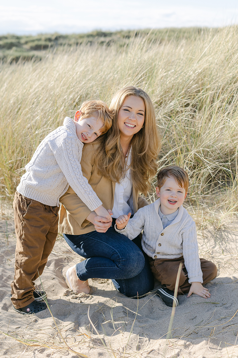 mum with her boys smiling at camera